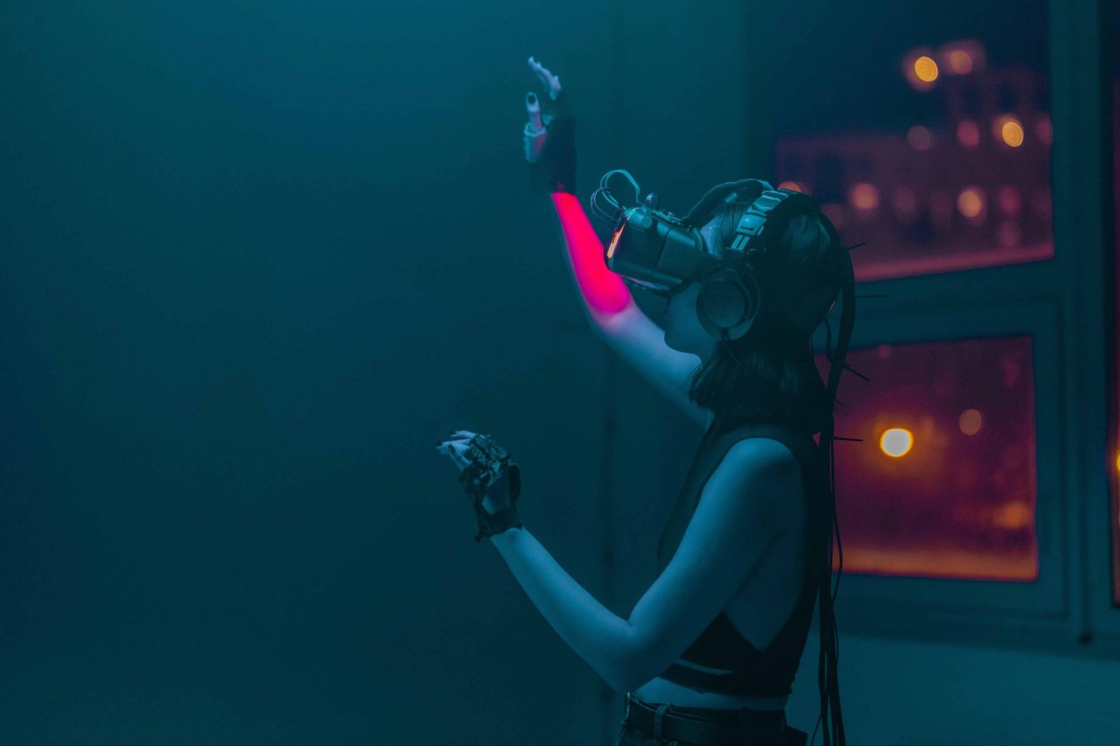 Image from Pexels by Cottonbro. Women fully emersed in an online game wearing a virtual headset.